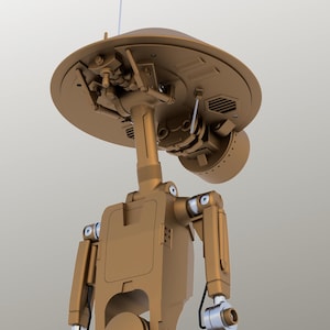 May include: A bronze robot with a distinctive design, featuring a large, circular head and a slender neck. The robot has articulated arms and legs with silver joints. A thin antenna extends from the top. The design evokes a retro-futuristic style, common in science fiction.
