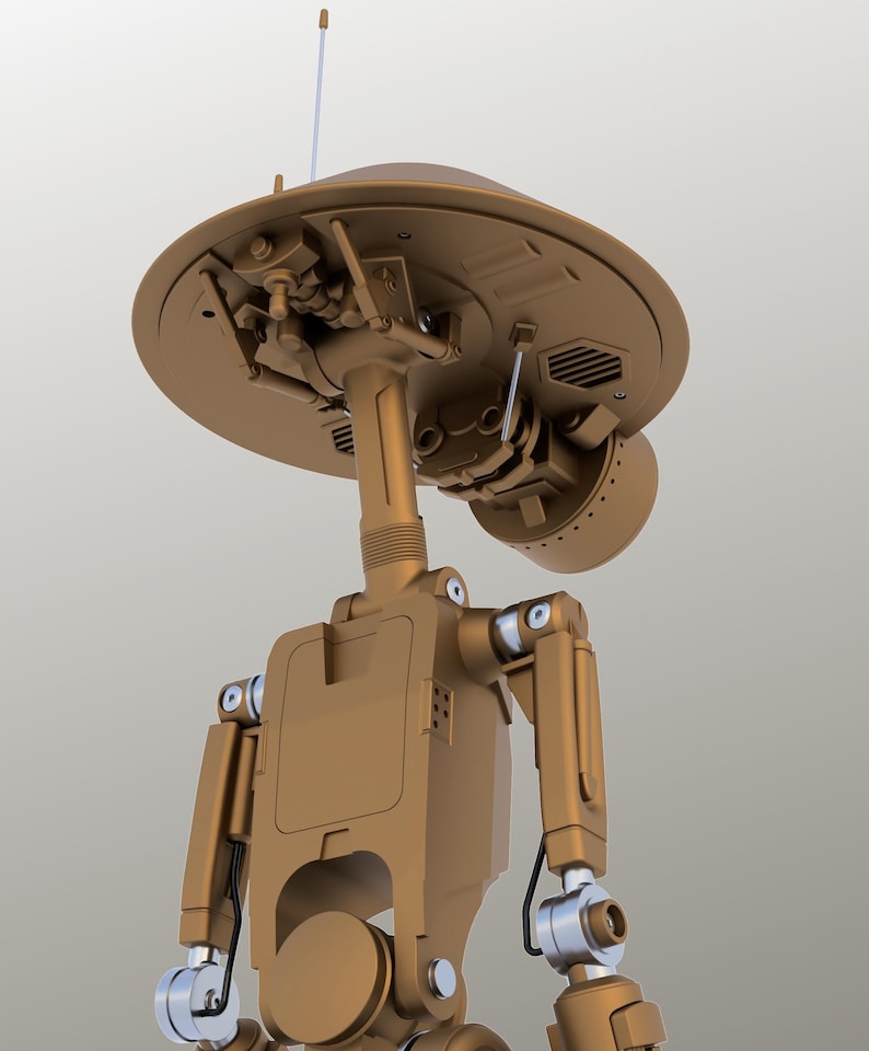May include: A bronze robot with a distinctive design, featuring a large, circular head and a slender neck. The robot has articulated arms and legs with silver joints. A thin antenna extends from the top. The design evokes a retro-futuristic style, common in science fiction.
