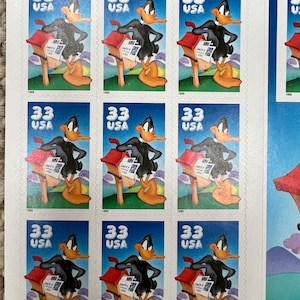 USPS NEW Mint  Rare find, 1999 Daffy Duck collectable stamps  stamp set of 10, .33 cent stamp