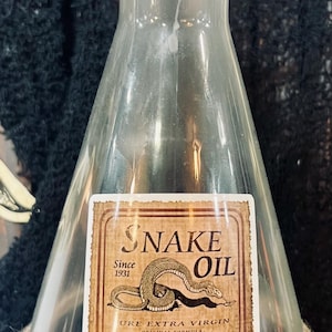 assorted medium sized glass potion bottle