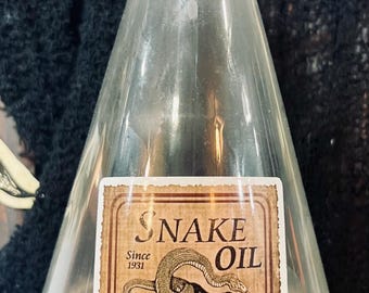 assorted medium sized glass potion bottle