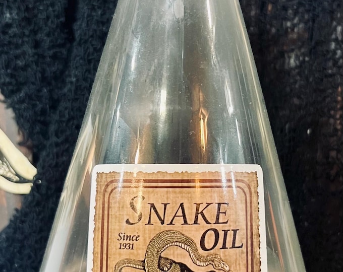 assorted medium sized glass potion bottle
