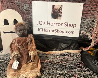 Hand painted upcycled “Haunted” dolls