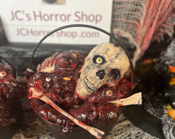 Featured listing image: A “Boiling” pot of fake body parts Halloween prop