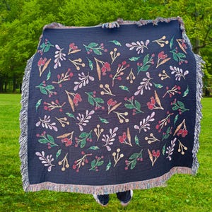Botanical Woven Throw Blanket Textile Nature Inspired Leaf Pattern Earthy Tone Minimalist Design Berry Motif Cozy Reading Nook Accessory