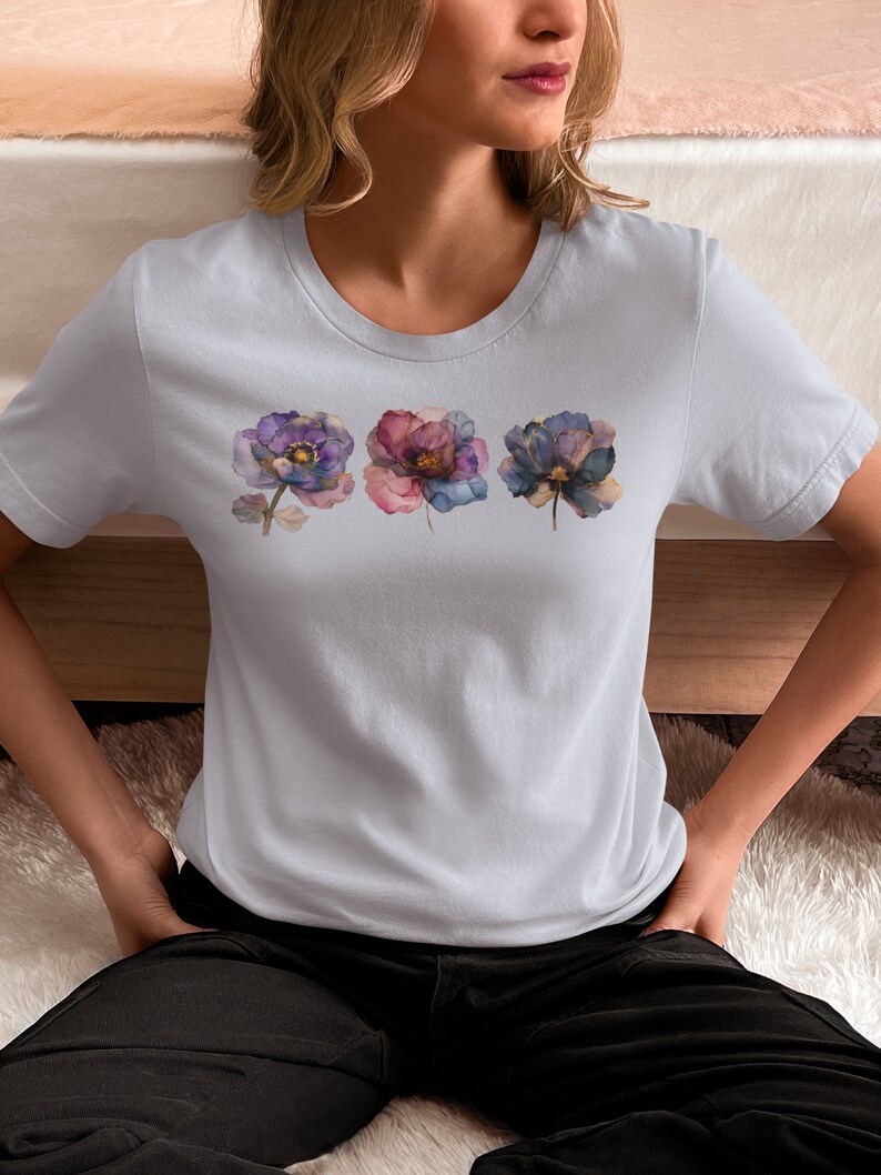 Bohemian Flower Tshirt Watercolor Design Botanical Artwork Floral Pattern Delicate Blooms Purple Blue Accents Cottagecore Aesthetic Feminine Fashion Trendy Apparel Garden Inspired Nature Theme Beautiful Illustration Comfortable Cotton