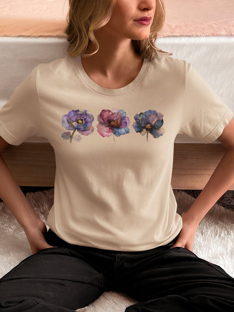 Comfortable Cotton Fabric Bohemian Flower Tshirt Watercolor Design Botanical Artwork Cottagecore Aesthetic Feminine Fashion Trendy Apparel Garden Inspired Nature Theme Beautiful Illustration Delicate Blooms Purple Blue Accents Gold Detail