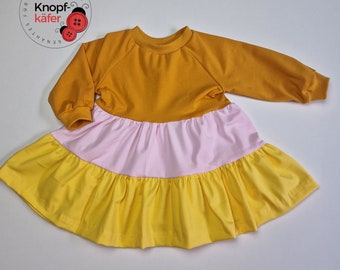 Raglan flounce dress/twist dress for children with block stripes