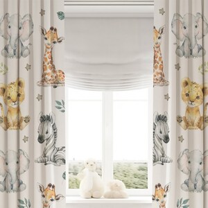 May include: Off-white curtains featuring a repeating watercolor print of baby animals including elephants, giraffes, zebras, and lions. The design is accented with small green leaves and brown stars scattered across the fabric surface.