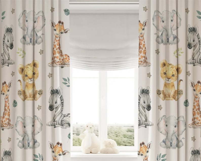 May include: Off-white curtains featuring a repeating watercolor print of baby animals including elephants, giraffes, zebras, and lions. The design is accented with small green leaves and brown stars scattered across the fabric surface.