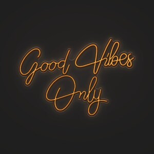 the words good vibes only written in neon lights