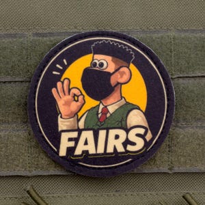 Mässor – Meme-reaktionslapp med kardborreband