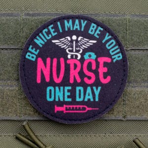 May include: A round, navy blue patch with the text "BE NICE I MAY BE YOUR NURSE ONE DAY". The text is in white, pink, and teal. A medical symbol and syringe are also featured.