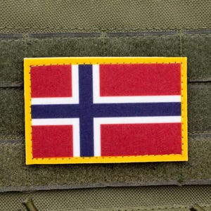 May include: A red, white and blue Norwegian flag patch with a yellow border. The patch is attached to a green tactical vest.