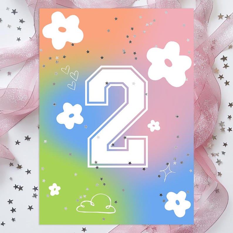May include: A birthday card with a colorful gradient background of orange, pink, blue, and green. The number "2" is prominently displayed in white with a collegiate font. White flowers, hearts, stars, and a cloud graphic decorate the card. Silver star confetti and pink ribbon are in the background.