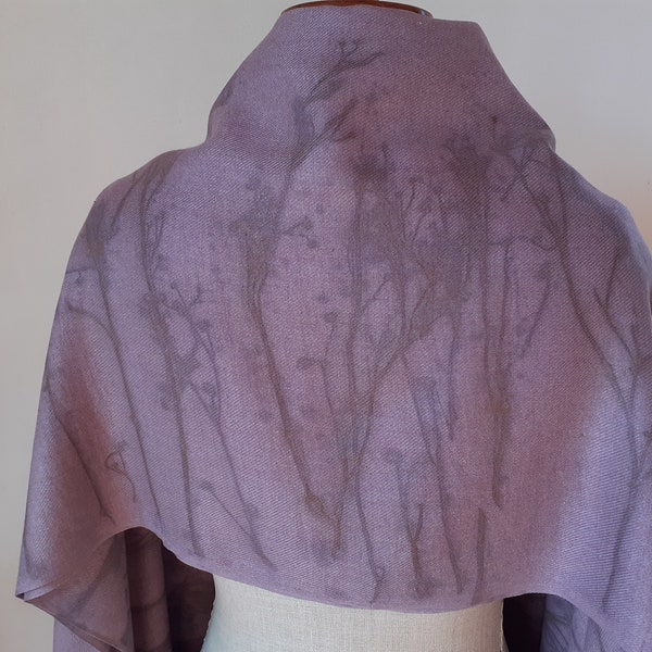 An oversized scarf made of purple pashmina, botanically printed with winter twigs