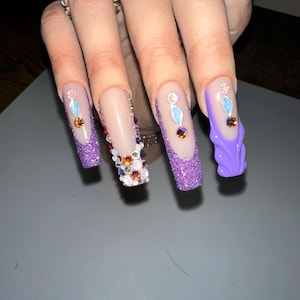Long Tapered Square Acrylic Press On Nails with nail art and high quality rhinestones.