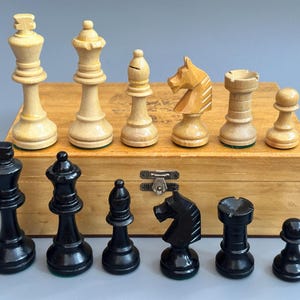 French chess set with weights Chess box and vintage Chess pieces Elegant chessmen