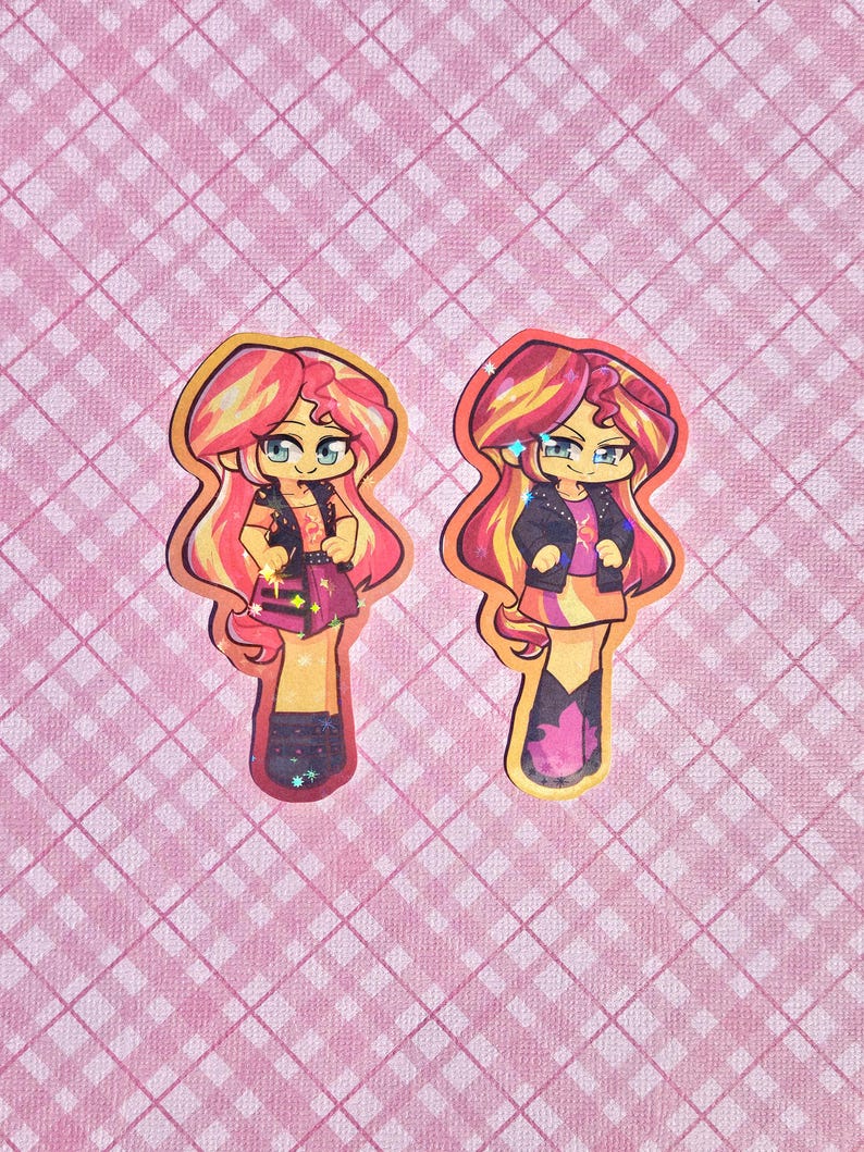 May include: Two cartoon stickers featuring a character with red and yellow hair, wearing a black jacket, purple skirt, and boots. The stickers have a yellow outline and are set against a pink plaid background.