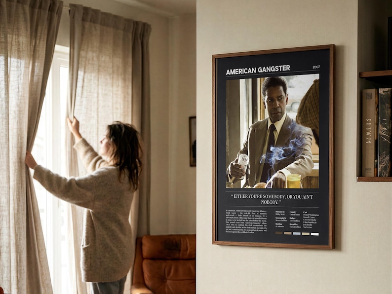 American Gangster poster, Dark edition, framed and on a wall as the morning curtains are drawn