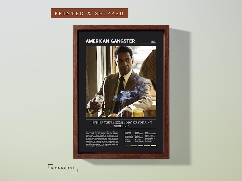 American Gangster poster, Dark edition, framed in walnut and hung on a plain wall