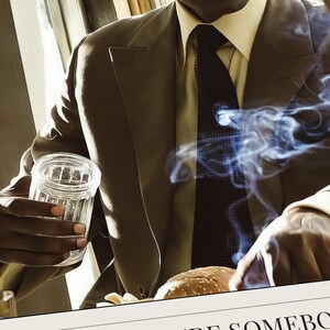 Close-up of the printed American Gangster poster, showing the matte surface of the paper