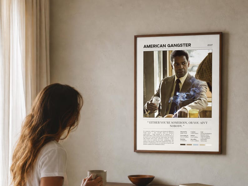 American Gangster poster, Light edition, framed and hung above a bed in a sunlit bedroom