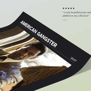 Corner of the American Gangster poster, Dark edition, lifted to show the weight of the paper