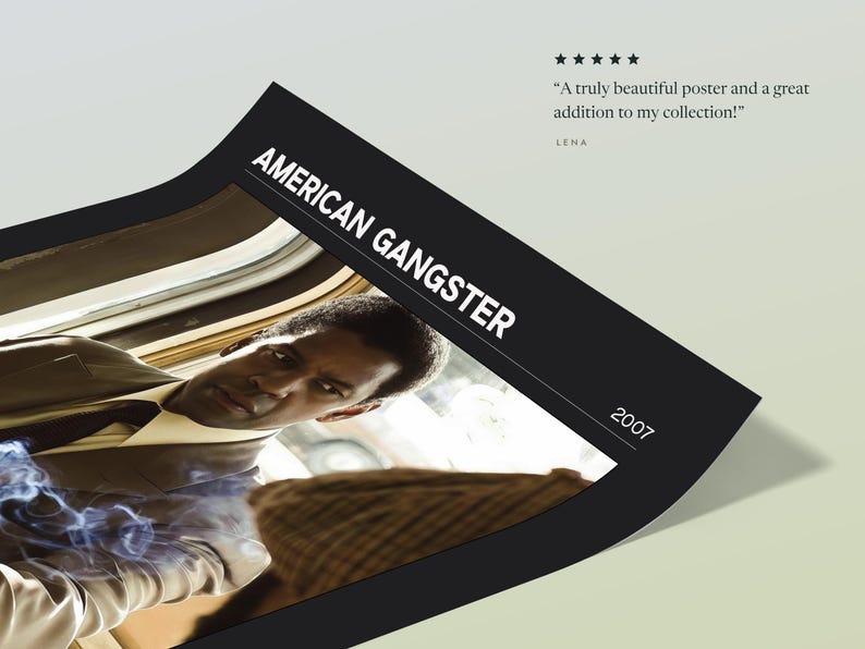 Corner of the American Gangster poster, Dark edition, lifted to show the weight of the paper