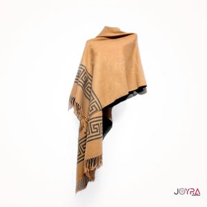 May include: A brown alpaca wool shawl with a black and white geometric pattern. The shawl has fringe on the edges.