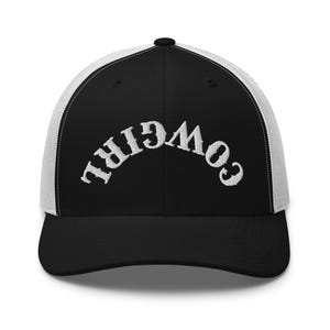 May include: Black and white trucker hat with a white embroidered logo that reads "COWGIRL" in a backwards script.