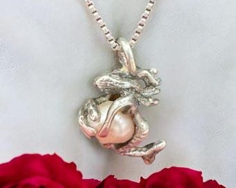 Artisan 925 mermaid pendant with freshwater pearl necklace.