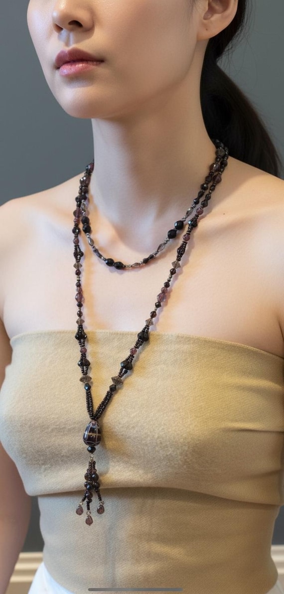 Vintage black Murano wedding cake and second black crystal necklace.
