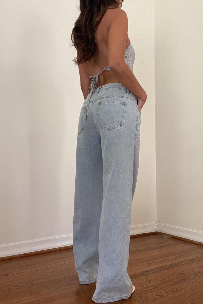 Wide leg Jeans with croc effect and rhinestones