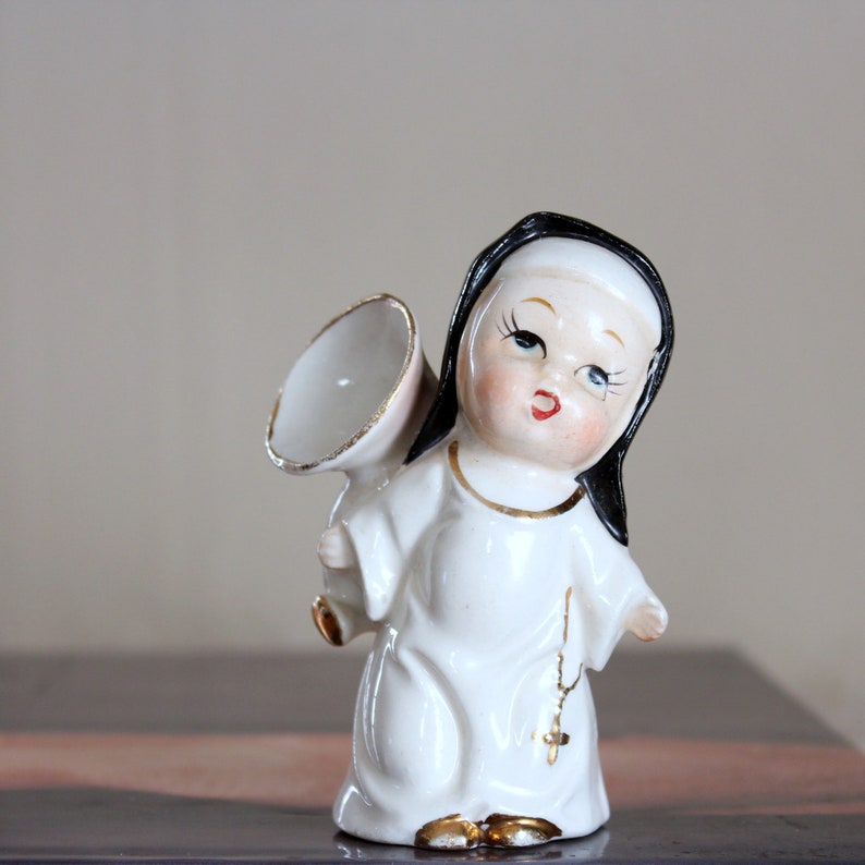 1950s vintage nun with sousaphone or french horn Japan image 0