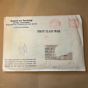 May include: A vintage envelope from the "Report on Farming" pattern department, postmarked May 18, 1976, with a Canadian postage stamp. The envelope includes handwritten notes and text that reads "First Class Mail."