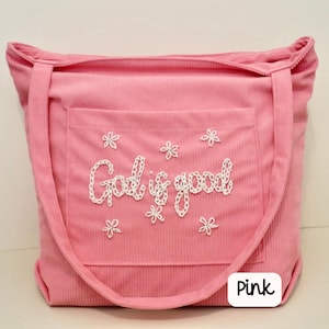 Soft pink corduroy Christian tote bag with zipper and large front pocket. Handmade embroidered scripture adds a feminine touch, perfect for Bible study, Sunday school, or daily devotion. Stylish and functional tote for women, ideal for faith-driven gifts, Bible carrying bag, and everyday Christian accessory. Embroidered Christian Corduroy Tote Bag Bible Study Shoulder Bag with Zipper Brown God Is Good Crossbody Handbag, Christian Church Tote Bag Bible Carry Bag Religious Canvas Bag for Women