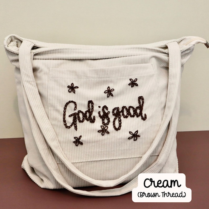 Elegant cream corduroy Bible tote bag with zipper and spacious front pocket. Hand-embroidered faith design, ideal for church, Bible study, or Sunday school. Chic, handmade Christian tote for women, perfect gift for faith-forward book lovers, Bible carrying bag, or stylish daily devotional accessory. Chain stitch tote bag embroidery faith based religious gift idea for coworker Christmas Gift.