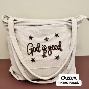 Modern embroidered Christian corduroy travel tote with zipper closure and interior pockets, ideal for carrying your Bible, planner, and essentials on the go. Designed for women of faith balancing devotion and daily life. Use as a stylish carryall for retreats, church events, or weekend trips. A perfect blend of faith, function, and feminine charm.