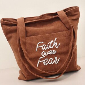Embroidered Bible Bag Tote Bag Christian Gift For Women Back To School Book Bag For Girl Baptism Gift For Sister Birthday Gift Ideas For Mom Birthday Present For Christmas Gift For Friend Religious. Faith over fear, God is good, Make heaven crowded, blessed, Jesus, Salt and Light, Saved by Jesus.