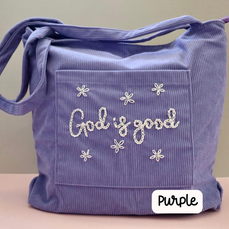 Handmade purple corduroy Bible tote with zipper closure and front pocket. Embroidered faith-inspired design perfect for church, Bible study, or everyday Christian use. Durable and stylish tote for women, ideal for gifting to Christian friends, carrying devotionals, or organizing Bible study essentials.