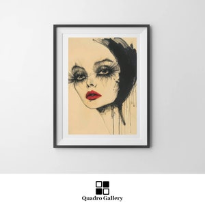 Può includere: Stampa artistica incorniciata con un ritratto stilizzato di una donna con trucco drammatico. L'opera presenta lunghe ciglia esagerate, rossetto rosso acceso e dettagli in inchiostro nero. La stampa è incorniciata in una cornice nera e proviene da Quadro Gallery.