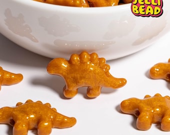 Cuentas de pepitas de dinosaurio: Dijes clave para pulseras kandi/de la amistad