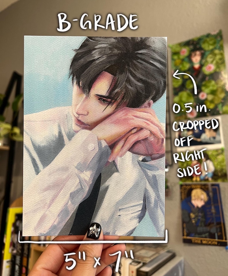 May include: A B-GRADE print of a portrait of a person wearing a white shirt and black tie. The print measures 12.7 cm by 17.8 cm. The text "B-GRADE" is at the top. The text "0.5 in. CROPPED OFF RIGHT SIDE!" is on the right side.