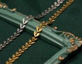 Roman Greek Leaf Chain Necklace: Gold & Silver Stainless Steel Choker product logo