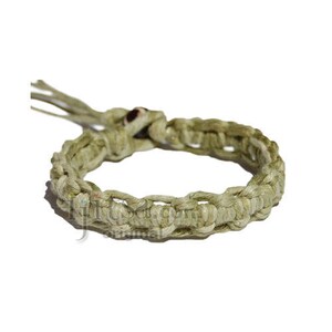 May include: A green hemp bracelet with a brown bead accent. The bracelet is made of braided hemp cord and is a simple, stylish accessory.