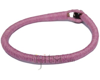 Leather bracelet wrapped with rose pink hemp