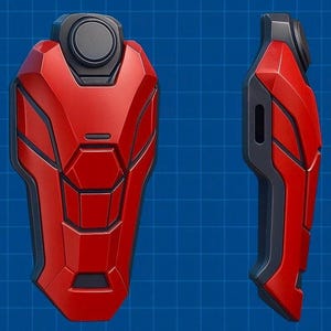 May include: A red and black futuristic-style shield or armor component. The object has a geometric design with a circular element at the top. The item is displayed against a blue grid background.