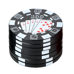 May include: Black and white poker chip grinder with a stack of chips. The top chip has a playing card design with the text "100" in the center.