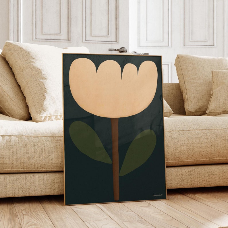 May include: A framed print of a stylized flower with a peach-colored blossom, brown stem, and green leaves on a dark blue background. The print is titled "remarkable".